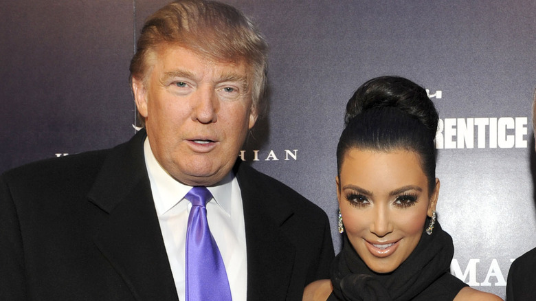 Donald Trump and Kim Kardashian posing