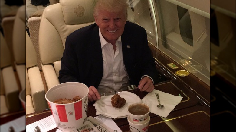 Donald Trump eating KFC on a plane