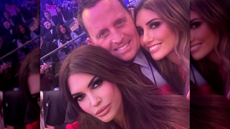 Kimberly Guilfoyle taking a selfie with Richard Grenell and Alina Habba