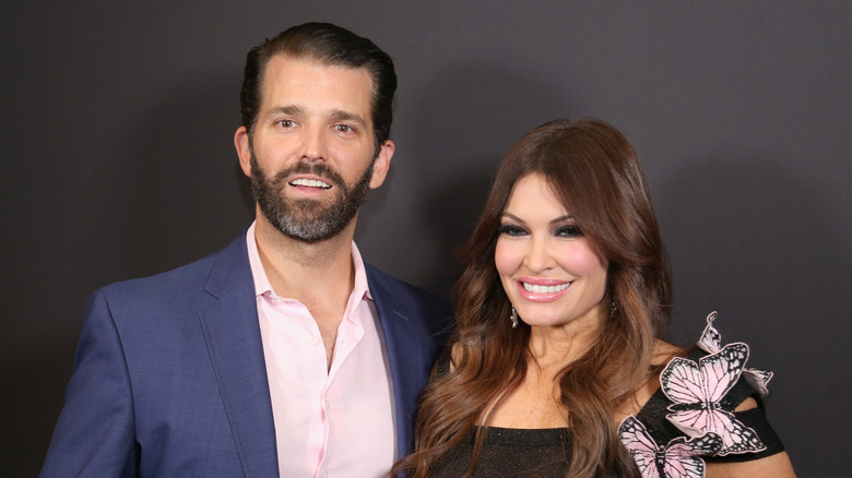 Donald Trump Jr. and Kimberly Guilfoyle smiling