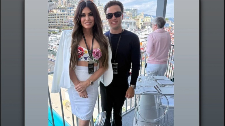 Kimberly Guilfoyle poses with a fan in Monaco for the Formula One Monaco Grand Prix (2025)