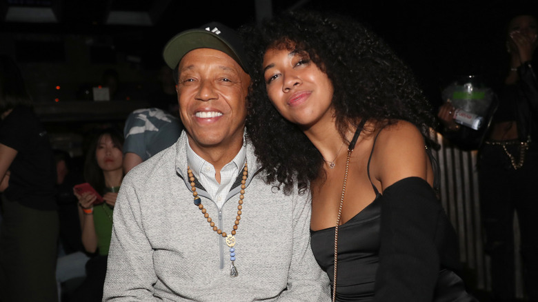 Russell and Aoki Lee Simmons posing