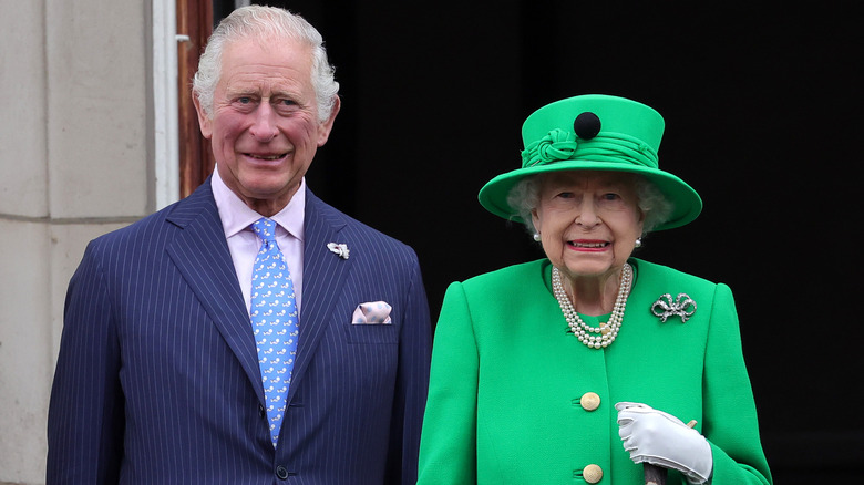 Prince Charles and Queen Elizabeth pose for photos