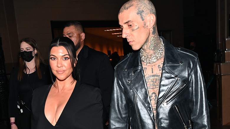 Kourtney Kardashian and Travis Barker attend the 64th Annual GRAMMY Awards