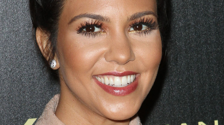 Kourtney Kardashian smiling