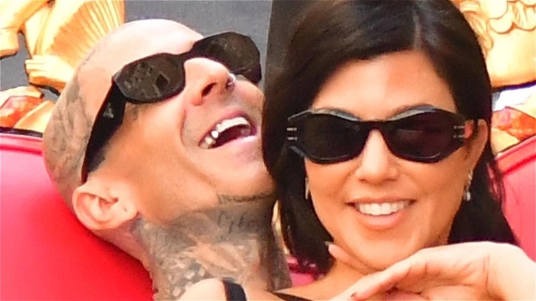 Travis Barker and Kourtney Kardashian having fun in Italy