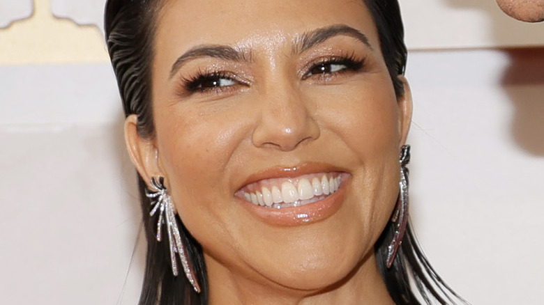 Kourtney Kardashian smiling