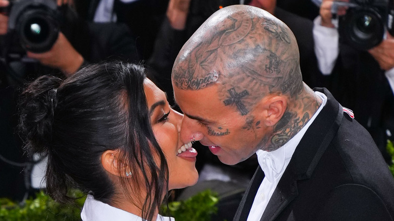 Kourtney Kardashian Travis Barker tongue kissing