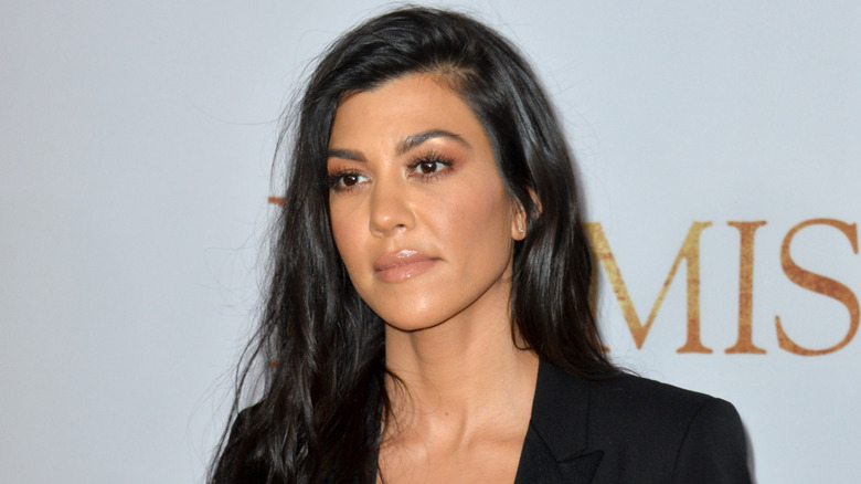 Kourtney Kardashian posing