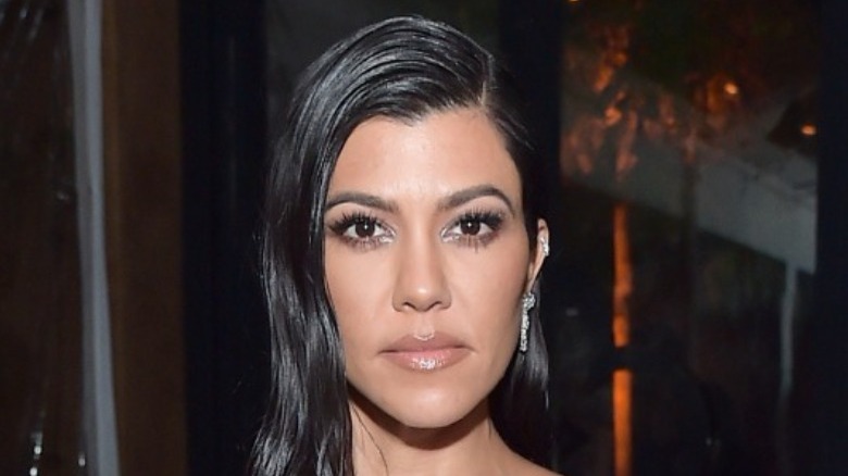 Kourtney Kardashian posing