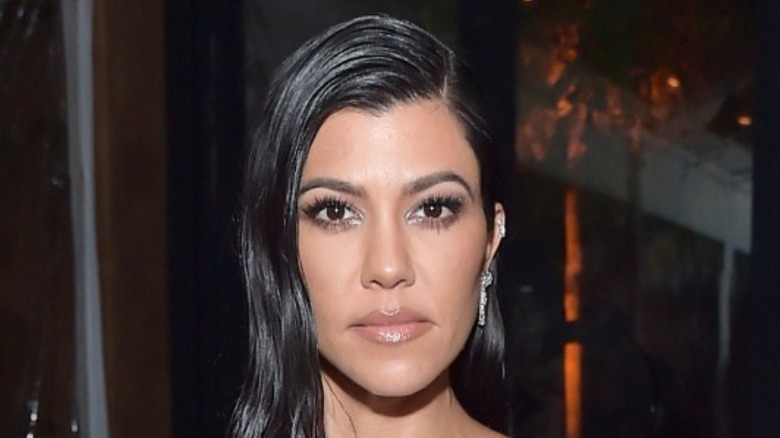 Kourtney Kardashian posing