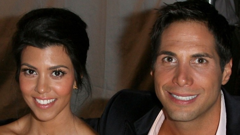 Kourtney Kardashian Joe Francis smiling