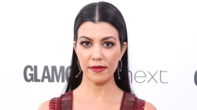 Kourtney Kardashian parted hair