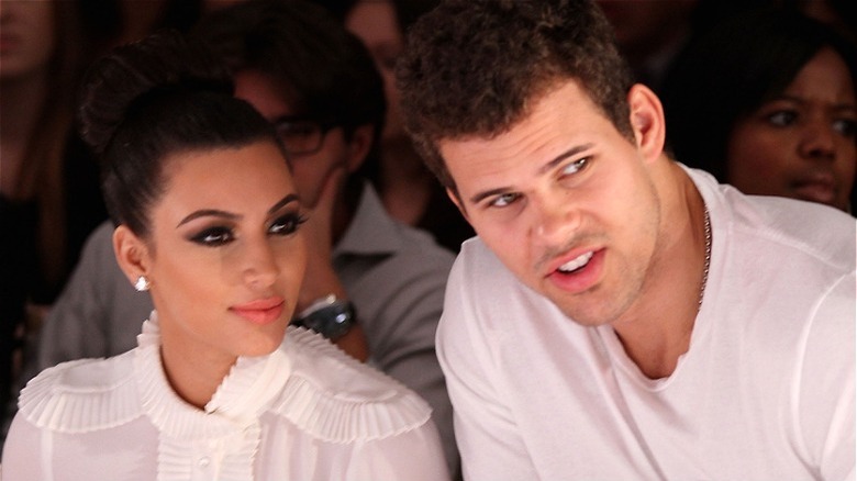 Kim Kardashian and Kris Humphries at a fashion show