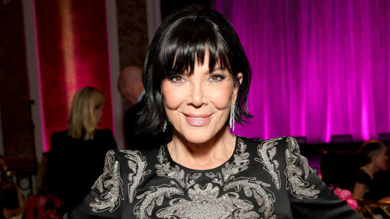 Kris Jenner with choppy bangs and a flipped-out bob at an event in March 2026.