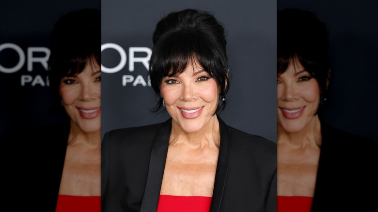Kris Jenner wearing her hair styled in a bouffant at a 2025 L'Oreal event.
