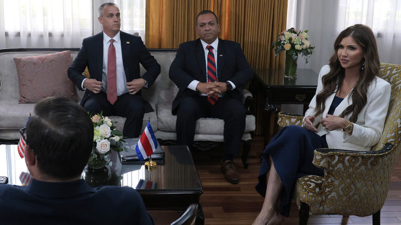 Corey Lewandowski, Kristi Noem and others in a meeting