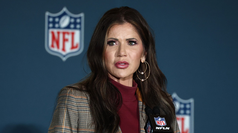 Kristi Noem speaking at the Super Bowl