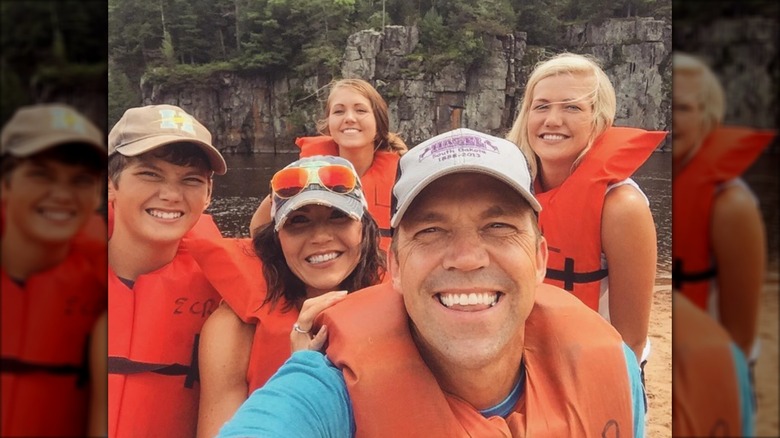 Bryon and Kristi Noem pose for a selfie with their children.