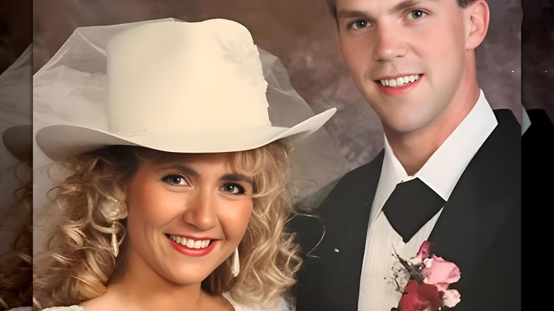 Kristi Noem posing for her wedding photo with curly blonde hair and a white stetson