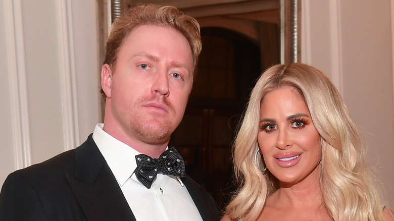 Kroy Biermann black tux Kim Zolciak wavy hair