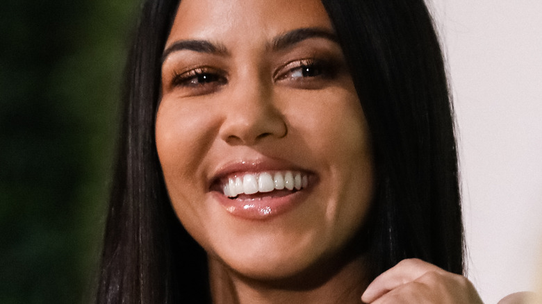 Kourtney Kardashian speaks at an event