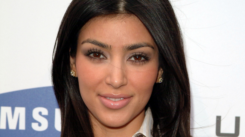 Kim Kardashian smiles at an event in 2007