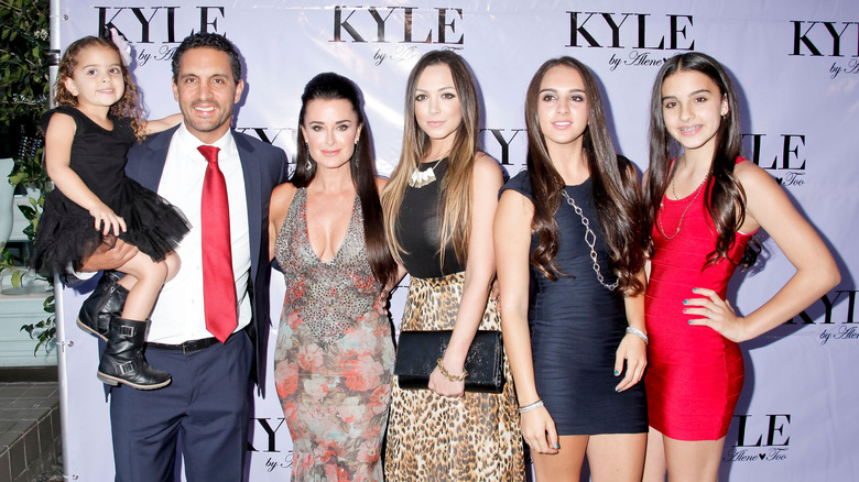 Kyle Richards poses with her family 