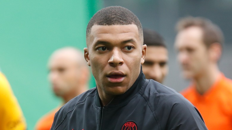 KylianMbappé looking away