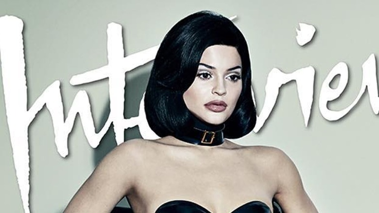 Kylie Jenner sitting in wheelchair