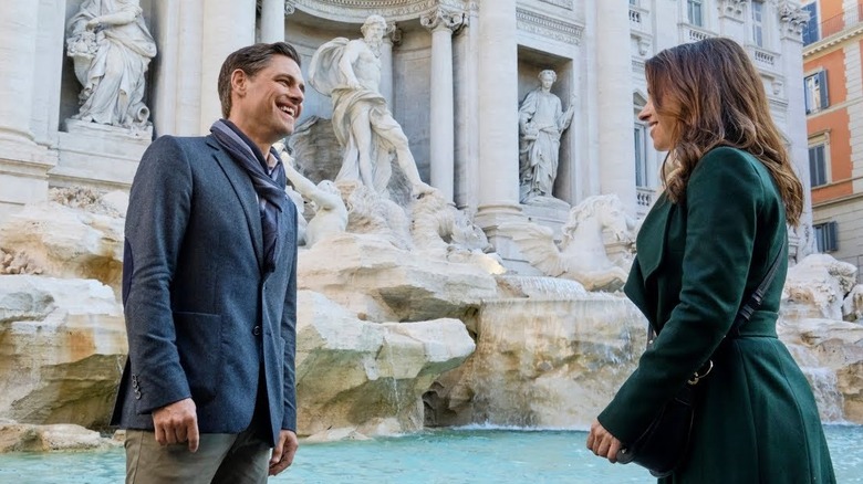Sam Page and Lacey Chabert in Christmas in Rome