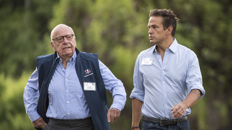 Rupert and Lacklan Murdoch walking
