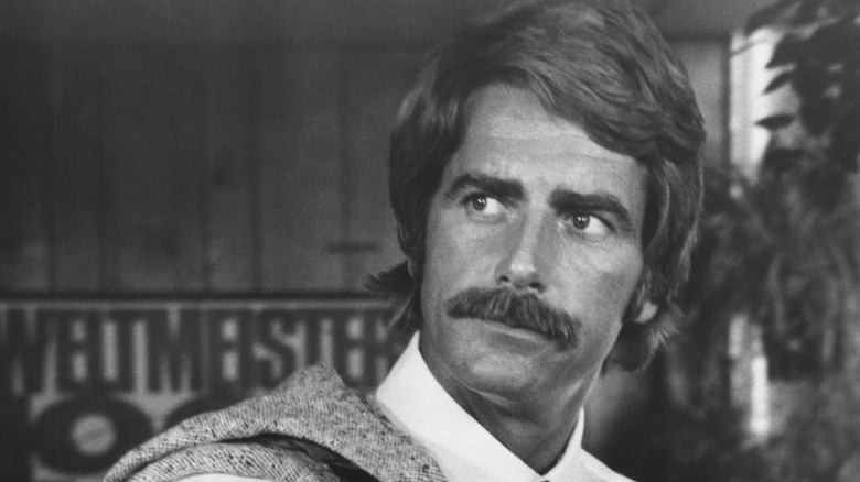 Sam Elliott poses in 1975