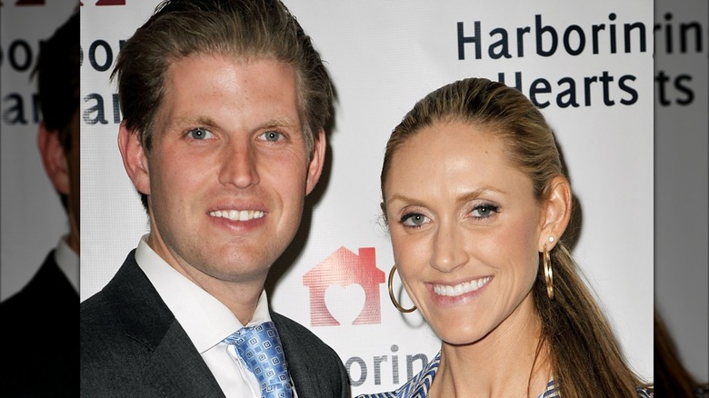 Eric Trump posing with Lara Trump