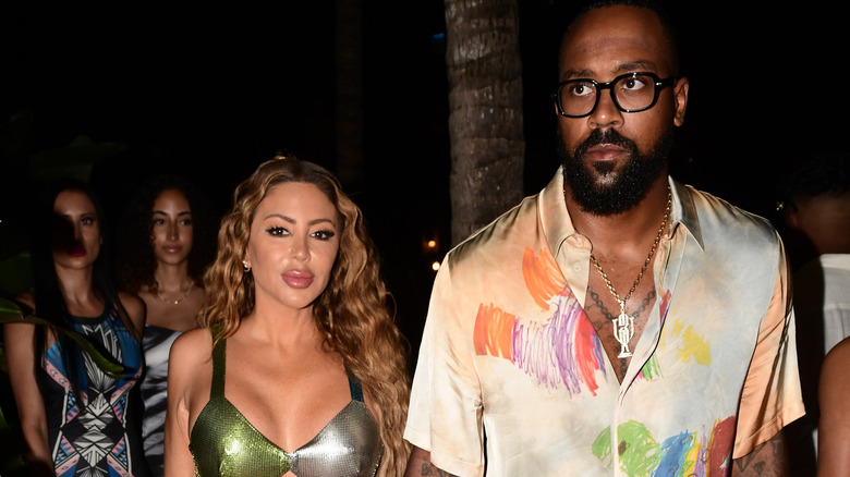 Larsa Pippen Marcus Jordan holding hands