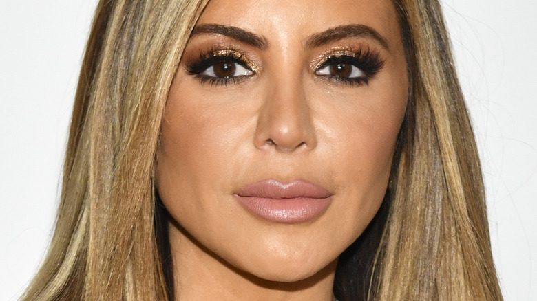 Larsa Pippen brown straight hair full glam