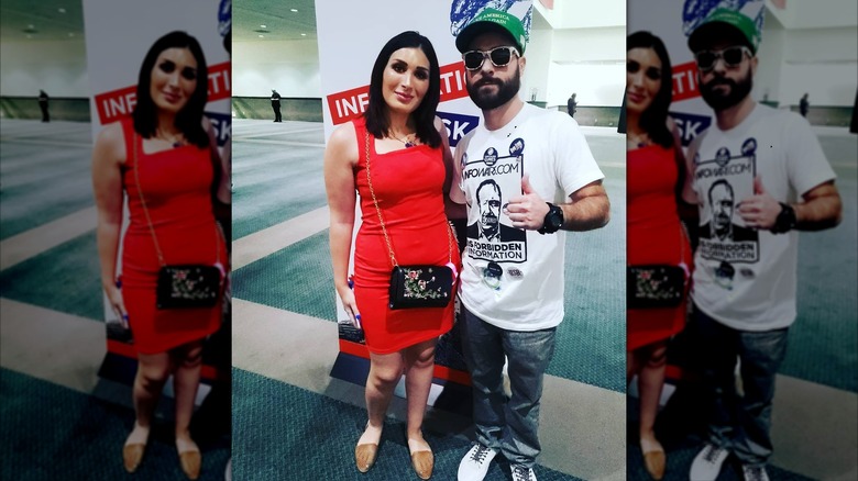 Laura Loomer wearing red dress