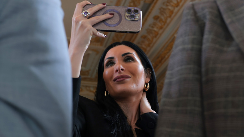 Laura Loomer records with her phone during Mar-a-Lago event in 2026