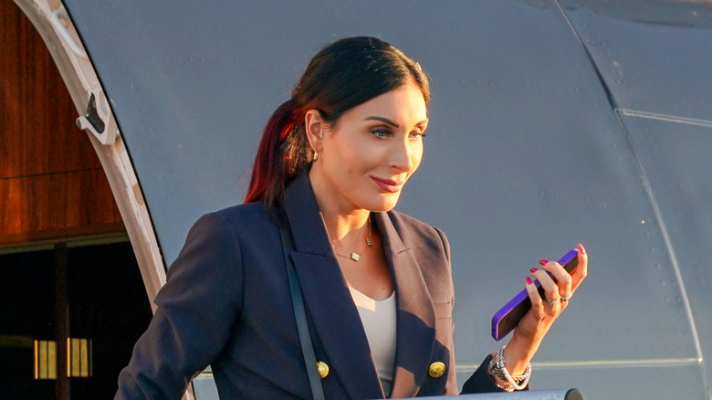 Laura Loomer exiting a plane