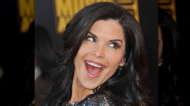 Lauren Sanchez wide eyed and laughing on the red carpet