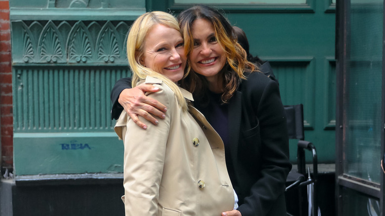Mariska Hargitay with arm around Kelli Giddish