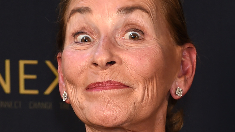 Judge Judy posing on the Emmy carpet