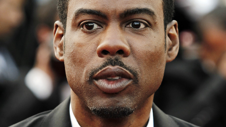 Chris Rock posing