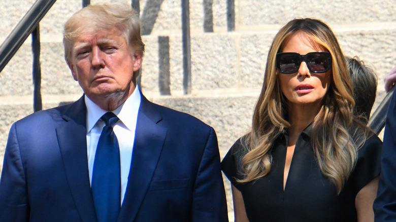 Donald and Melania Trump frowning