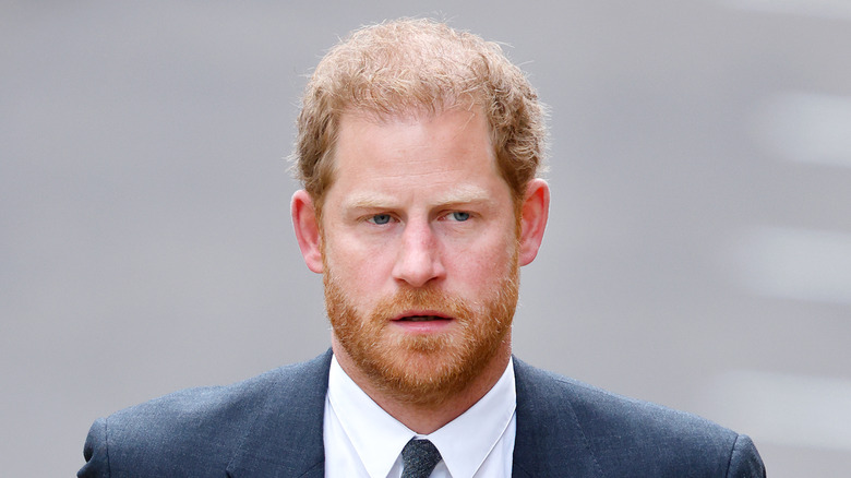 Prince Harry looking serious in candid close-up