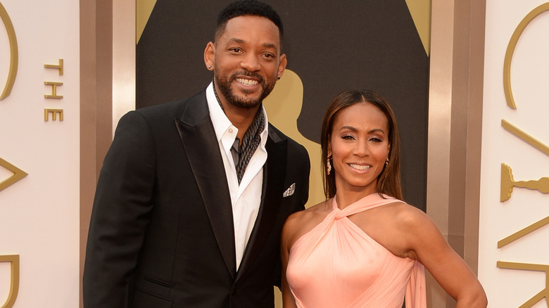 Will Smith and Jada Pinkett Smith smiling