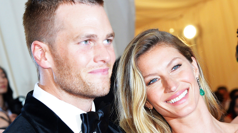 Tom Brady and Gisele Bundchen posing