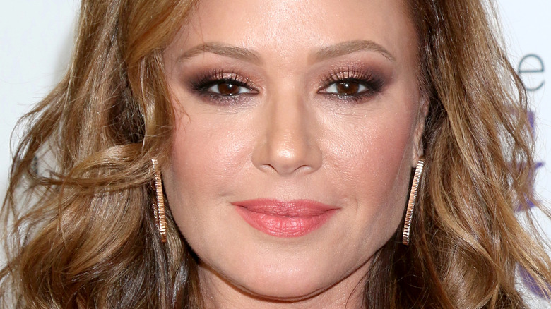 Leah Remini poses at an event
