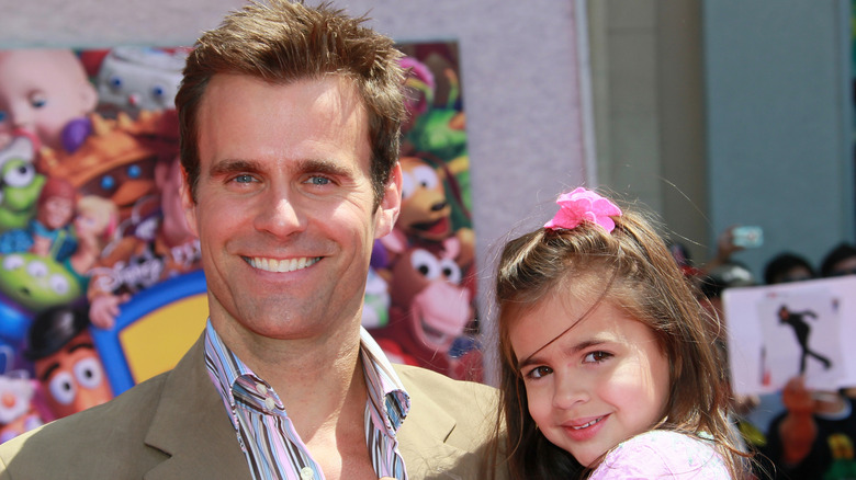 Cameron Mathison holds young Leila in 2010
