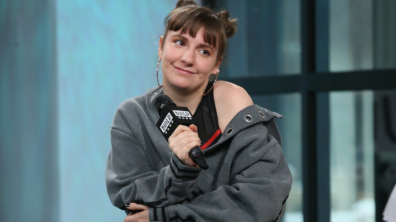Lena Dunham shrugs 